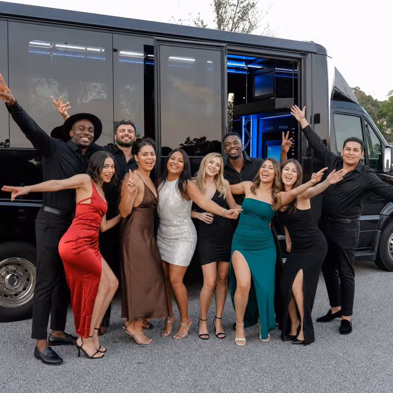 Party bus interior with wraparound leather seating and LED lighting in Huntington Beach