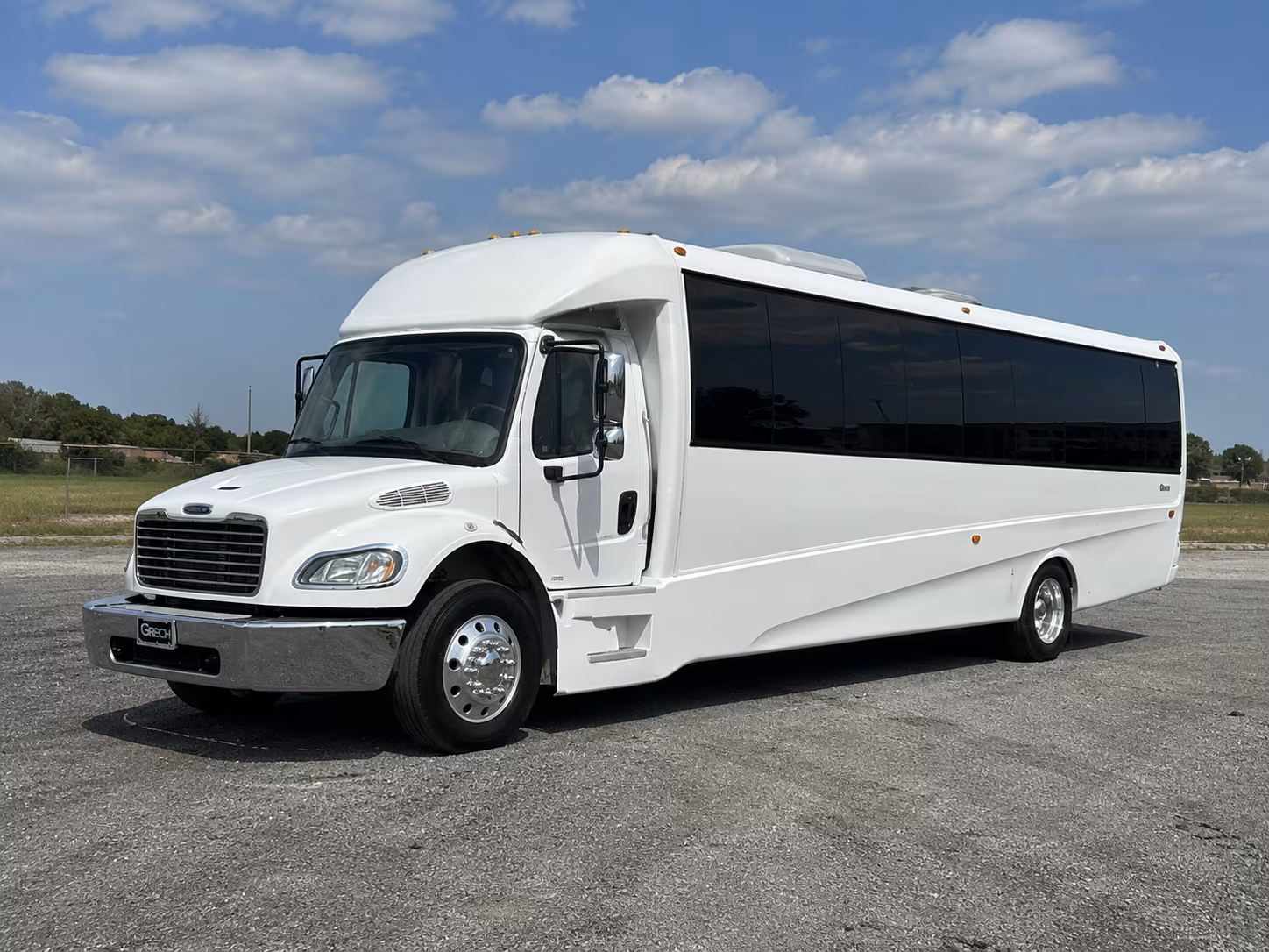 Passenger seating aboard a party bus rental serving Huntington Beach