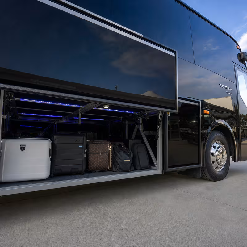 Party bus interior with wraparound leather seating and LED lighting in Huntington Beach