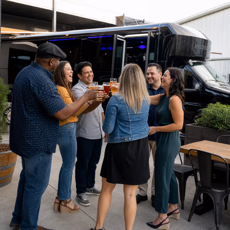Passengers loading luggage while boarding an Huntington Beach group shuttle